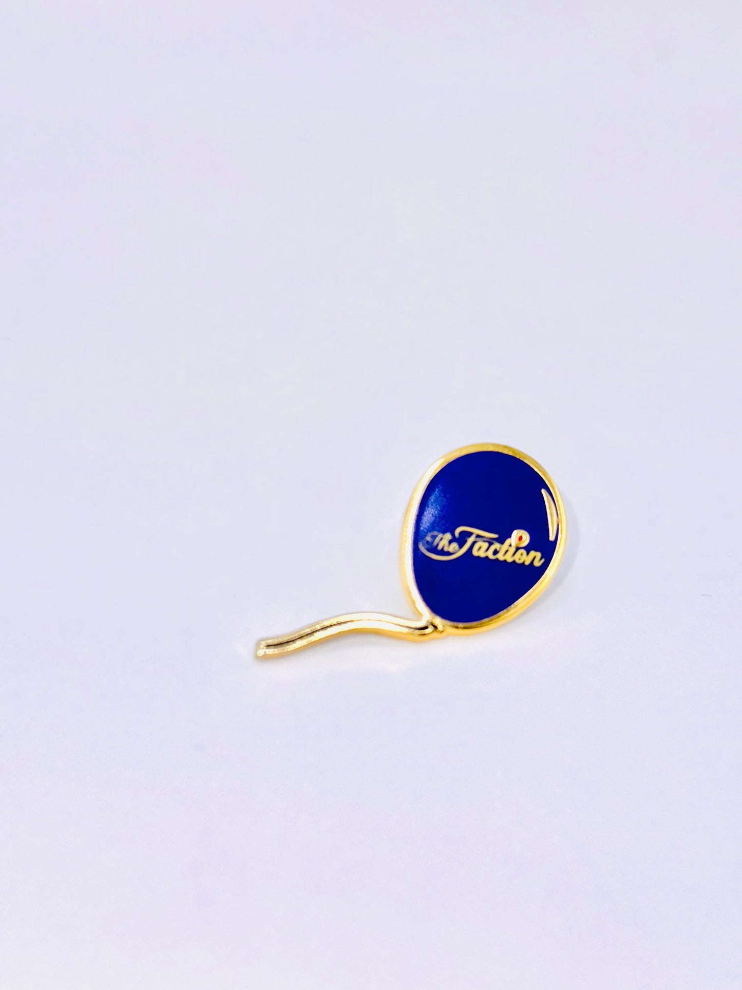 The Faction Purple Balloon Lapel Pin