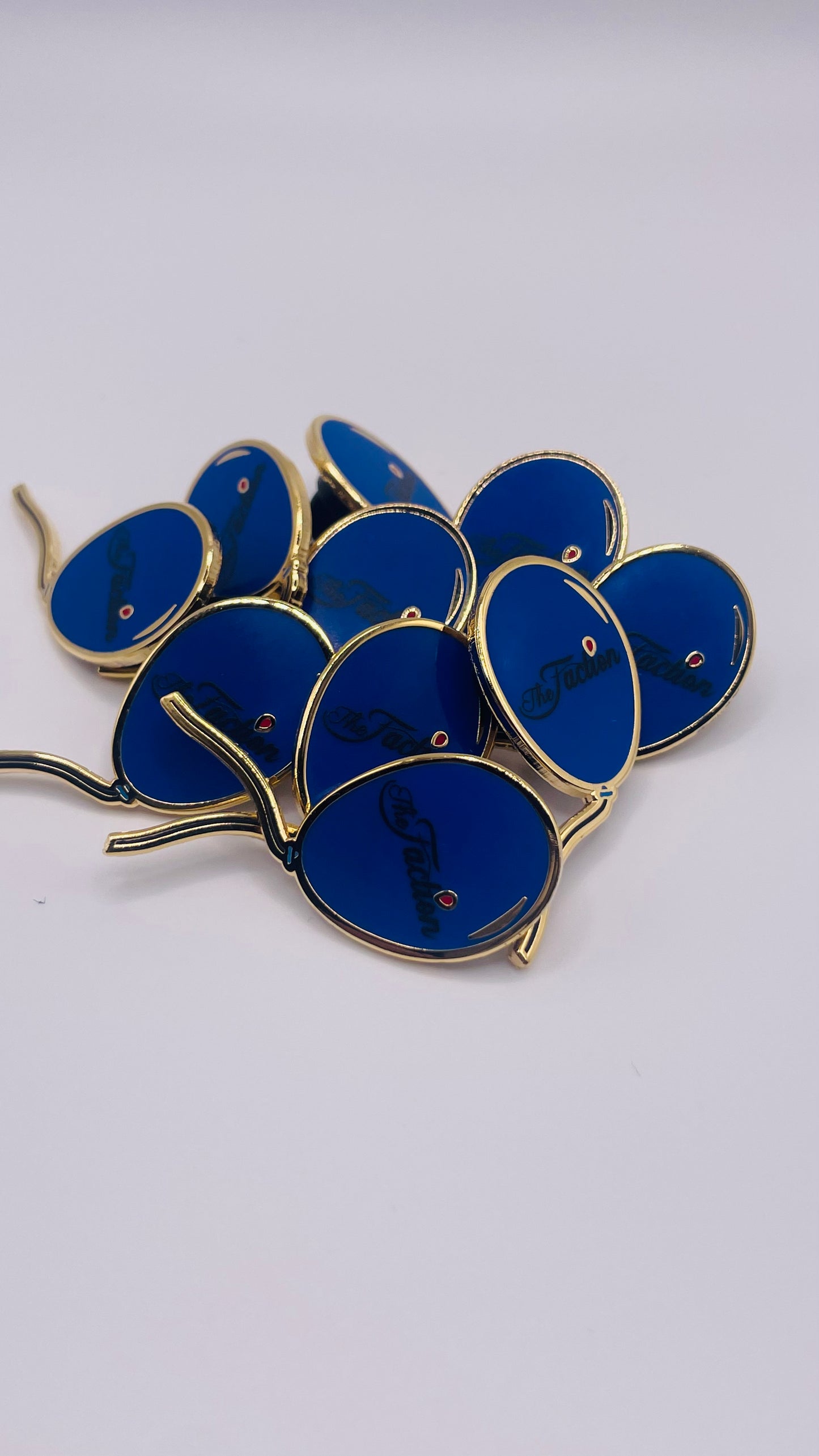 The Faction Blue Balloon Lapel Pin