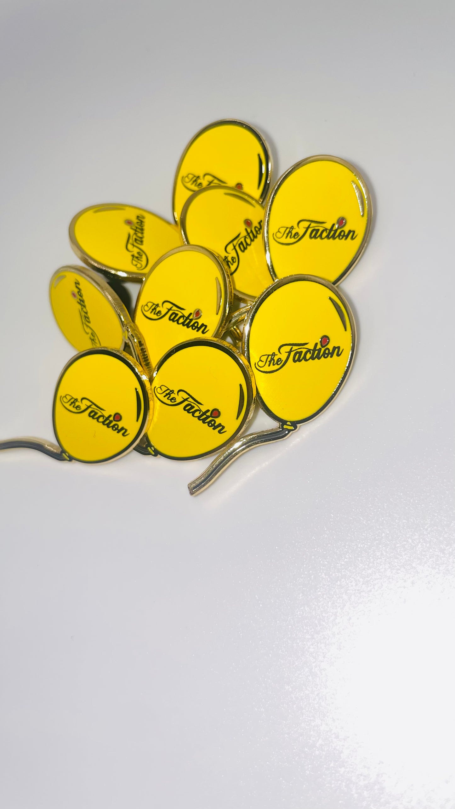 The Faction Yellow Balloon Lapel Pin