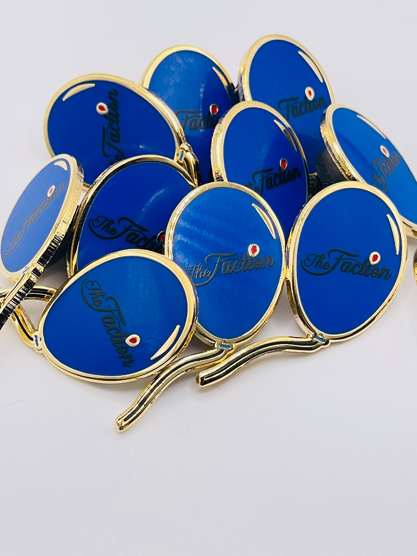 The Faction Blue Balloon Lapel Pin