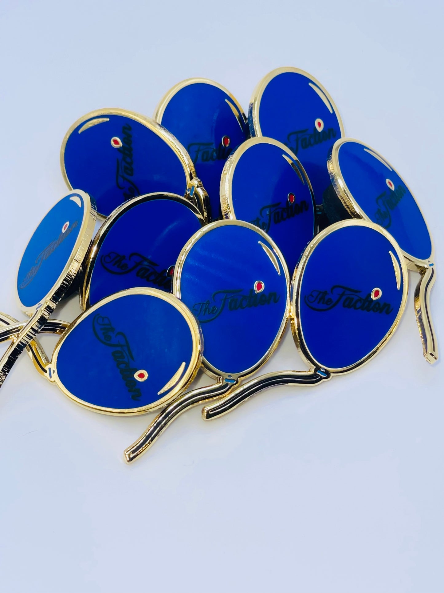 The Faction Blue Balloon Lapel Pin